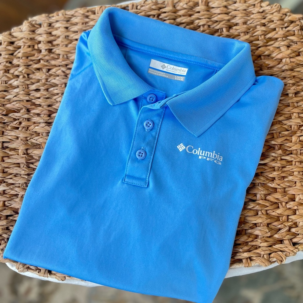 Columbia boys blue performance polo size YL (10-12)